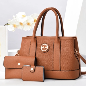 Three-piece brown lychee pattern handbag set with tote and wallets on white background
