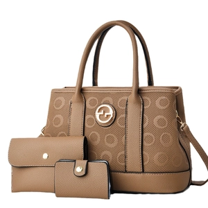 Brown lychee leather 3-piece bag set with tote, clutch, and wallet in textured print
