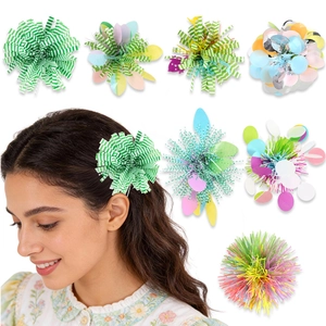 Detail of colorful striped macaron hair clips with iridescent sequins for Easter party decor