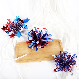 Detailed view of patriotic red white and blue tinsel decorations with shiny star sequins