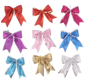 Détail de neuf nœuds de Noël colorés de 13 cm avec paillettes pour décoration
