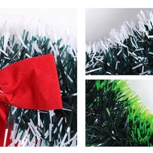 35cm green Christmas wreath with white snow-tipped tinsel and red velvet bow decoration