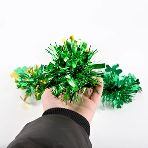 St. Patrick's Day fluffy green and gold metallic foil pom-poms with clover accents