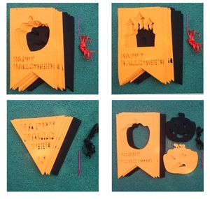 Detail of Halloween banner set with cutout pumpkin motifs and Happy Halloween letters