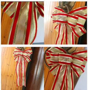 Close-up of red velvet Christmas bow with gold mesh layers for tree and door decoration