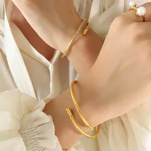 Minimalist gold twisted cable open cuff bracelet set with elegant double pearl ring