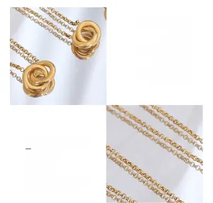 Detail of 18K gold plated surgical titanium steel interlocking circles pendant necklace