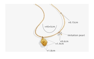Detailed macro view of 18K gold-plated irregular geometric pendant with imitation pearl
