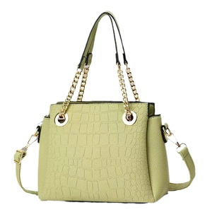 Mint green crocodile pattern leather handbag with gold chain handle and shoulder strap