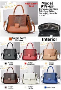 Detailed view of crocodile pattern patent leather handbag with size 26x9x18cm specifications