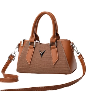 Fashion brown patchwork pillow handbag with woven fabric and adjustable shoulder strap