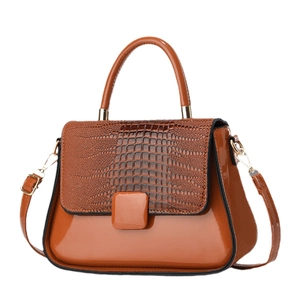 Brown crocodile pattern glossy patent leather handbag with adjustable shoulder strap