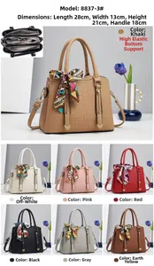 Detail view of stone-pattern bucket bag with multi-compartments and size dimensions
