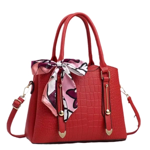 Red crocodile texture bucket handbag with floral scarf and golden heart hardware