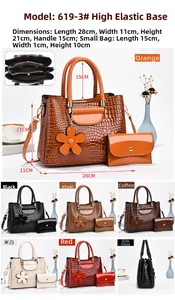 Detail of stone pattern tote bag set with crocodile texture and floral pendant charm
