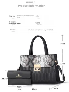Detail view of black snakeskin patterned handbag set with dimensions and gold buckle