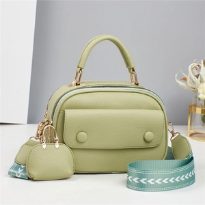 Light green pebble leather handbag with mini pendant pouch and geometric woven strap