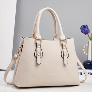 Minimalist ivory multi-layer tote bag with lychee texture and golden hardware accents