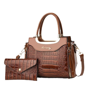 Dark brown crocodile embossed tote bag and envelope clutch set with metallic handles