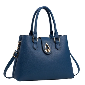 Borsa a mano blu scuro con trama litchi e chiusura dorata a goccia d'acqua a trapezio