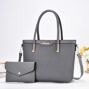 Ensemble cabas en toile gris foncé avec pochette assortie et détails dorés