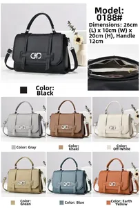 Detail of lychee pattern leather handbag with metal buckle and multi-layer inner structure