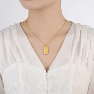 Retro gold vertical coin necklace with 1990 portrait relief on elegant beaded chain