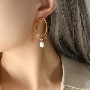 Elegant double-layered freshwater pearl tassel earrings in gold-tone metal finish