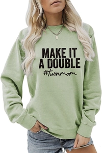 Close-up of MAKE IT A DOUBLE #twinmom screen print on sage green crewneck sweatshirt