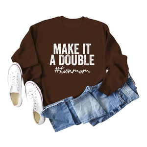 Detail of Make It A Double print on a dark brown crewneck sweatshirt for twin moms