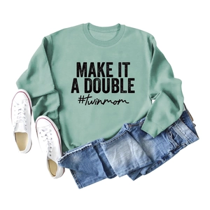 Sage green Make It A Double crewneck sweatshirt for twin moms styled with blue jeans