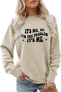 Nahaufnahme des beigen Sweatshirts mit It's Me Hi I'm The Problem It's Me Aufdruck