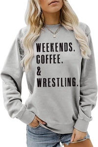 Detail of the Weekends Coffee lettering printed on a gray crewneck sweatshirt