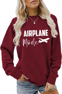 Détail de l'imprimé blanc AIRPLANE Mode et de l'icône d'avion sur le sweat bordeaux