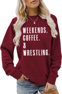 Detail of burgundy crewneck sweatshirt featuring white Weekends Coffee Wrestling print