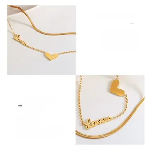 Detail of 18K gold-plated titanium steel double layer necklace with Love heart charms