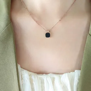Fashionable 18K gold titanium steel necklace featuring a black acrylic square pendant