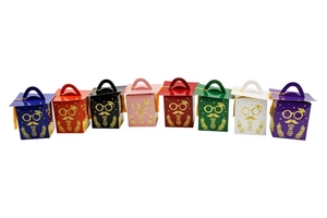 Detail of 8 graduation gift boxes with doctoral cap lids, tassels and gold foil patterns