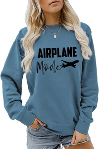 Détail de l'imprimé AIRPLANE Mode et silhouette d'avion sur le sweat-shirt en coton bleu