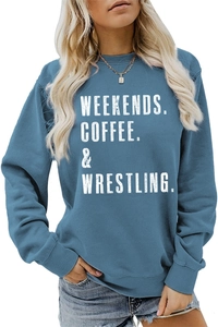 Detail of blue crewneck sweatshirt featuring white retro Weekends Coffee letter print