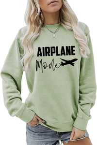 Détail du texte AIRPLANE Mode et silhouette d'avion sur sweat-shirt vert sauge