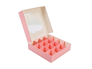 Detail view of pink 16-compartment gift box featuring a heart-shaped clear window