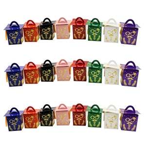 Graduation cap gift boxes in 8 colors featuring gold facial graphics and carry handles