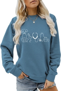 Detail of blue crewneck sweatshirt with white pet vet line art and ribbed cuffs