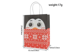 Detailed view of Christmas penguin kraft paper bag with dimensions 21x15x8cm and red snowflake pattern