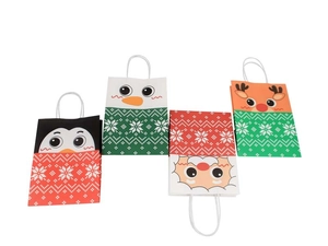 Detail of four Christmas kraft paper gift bags with penguin, snowman and Santa patterns