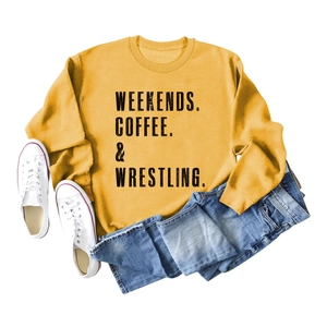 Ginger yellow long sleeve crewneck sweatshirt with Weekends Coffee wrestling print
