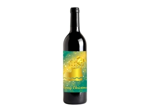 Detail of red wine bottle with gold foil Merry Christmas label and 3D Xmas boot