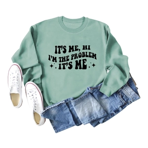 Minzgrünes Sweatshirt mit 'It's Me Hi I'm The Problem' Aufdruck und Sternen-Grafiken