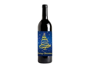 Macro detail of high-end gold foil Christmas wine label with Merry Christmas lettering
